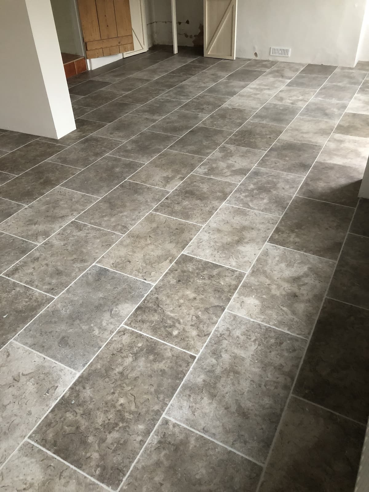 grey limestone floor tiling laid by david mutten tiling