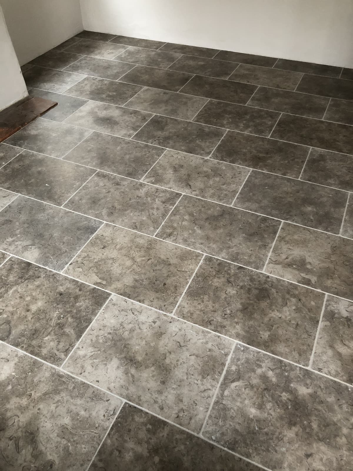 limestone floor tiling laid by aylsham based tiler
