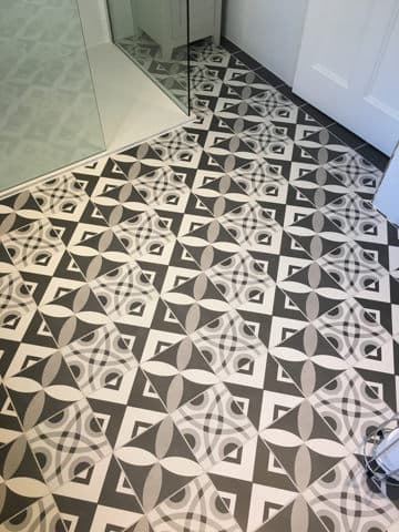 patterned bathroom floor tiling laid by norfolk based tiler
