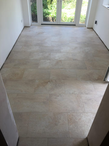 grey stone effect floor tiling laid in strumpshaw norfolk